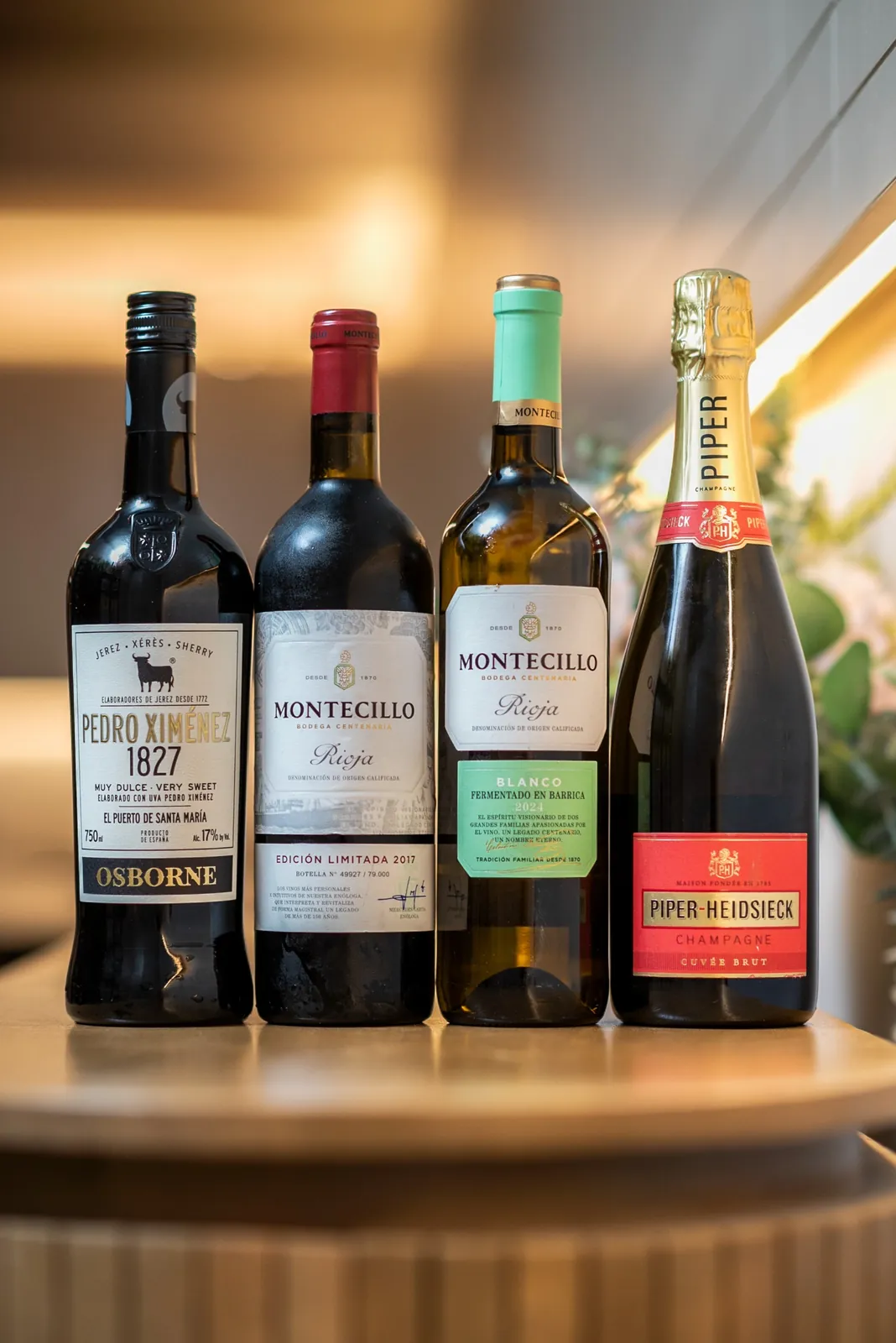 Cuatro botellas alineadas