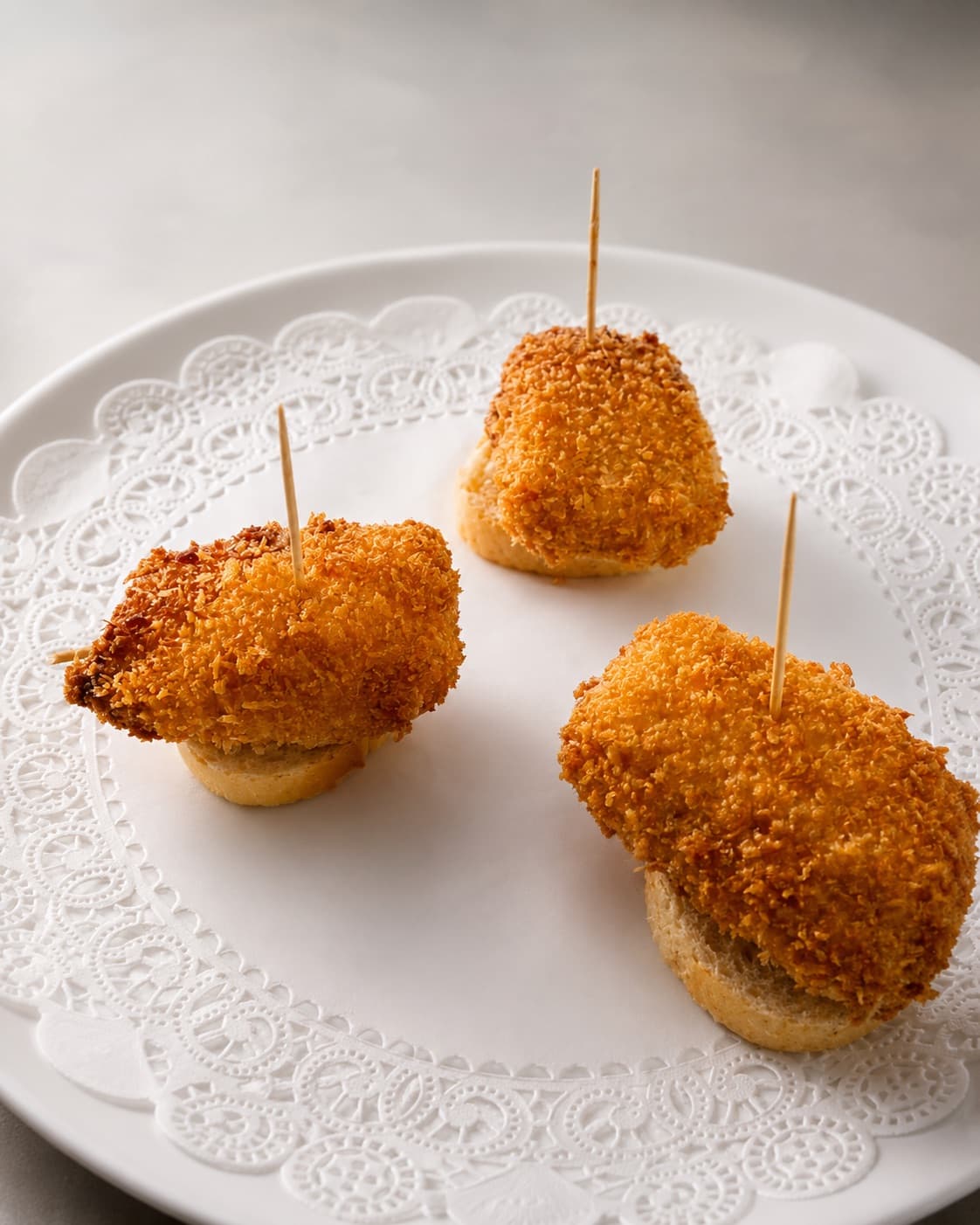Piruleta de camembert con jamón ibérico